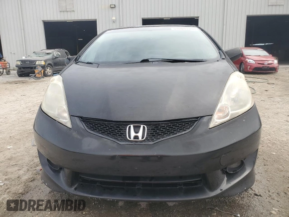 2009 Honda Fit Sport with VIN JHMGE88479S060797, listed as a Copart auction lot 54009135 with 167,914 mi miles and Salvage Title. Bid and sale history available at carsss.com. Image 5.