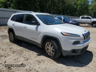 2014 Jeep Cherokee Latitude with VIN 1C4PJMCS6EW244336, listed as a Copart auction lot 52597835 with 167,266 mi miles and Salvage Title. Bid and sale history available at DreamBid. Image 4.