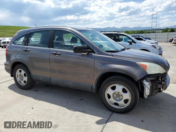 2009 Honda CR-V LX z VIN 5J6RE48399L025855, wystawiony jako Copart lot #60359355 z przebiegiem 262 261 mil mil oraz Czysty tytuł • Clean title. Historia ofert i sprzedaży dostępna na DreamBid. Obrazek 4.