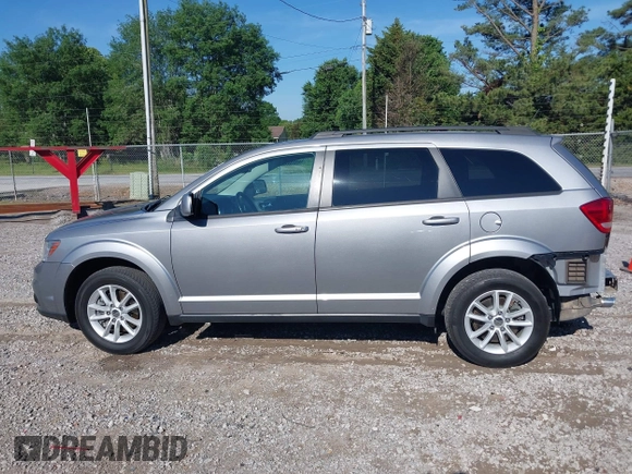 2017 Dodge Journey SXT z VIN 3C4PDCBG4HT563310, wystawiony jako IAAI lot #42190636 z przebiegiem 171 054 mil mil oraz . Historia ofert i sprzedaży dostępna na DreamBid. Obrazek 14.