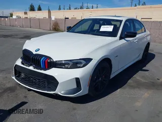 2023 BMW 3 Series 330e with VIN 3MW39FF02P8C89795, listed as a IAAI auction lot 41648172 with 27,179 mi miles. Bid and sale history available at carsss.com. Image 2.