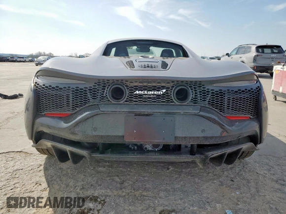 2024 McLaren Artura z VIN SBM16AEA3RW002188, wystawiony jako Copart lot #45177415 z przebiegiem 3440 mil mil oraz Szkody całkowita. Historia ofert i sprzedaży dostępna na DreamBid. Obrazek 6.
