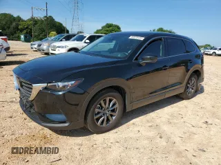 2023 Mazda CX-9 Touring z VIN JM3TCBCY3P0655644, wystawiony jako Copart lot #60078435 z przebiegiem 17 496 mil mil oraz Szkoda całkowita • Salvage title. Historia ofert i sprzedaży dostępna na DreamBid. Obrazek 1.