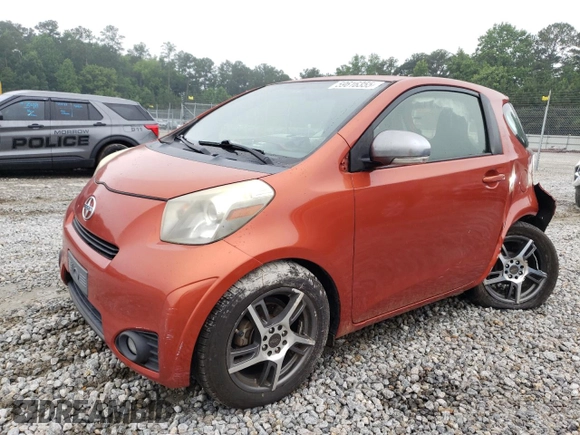 2012 Scion iQ with VIN JTNJJXB07CJ017816, listed as a Copart auction lot 59616355 with 141,384 mi miles and Salvage title. Bid and sale history available at DreamBid. Image 1.