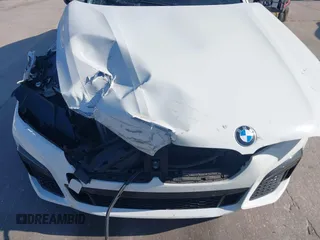 2020 BMW 7 Series 750i xDrive z VIN WBA7U2C05LGJ59941, wystawiony jako IAAI lot #42022091 z przebiegiem 50 605 mil mil oraz . Historia ofert i sprzedaży dostępna na DreamBid. Obrazek 11.