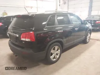 2012 Kia Sorento EX with VIN 5XYKUDA67CG306585, listed as a IAAI auction lot 42150969 with 128,792 mi miles. Bid and sale history available at carsss.com. Image 4.