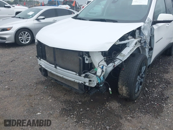 2021 Chevrolet Traverse RS with VIN 1GNERJKW9MJ233563, listed as a IAAI auction lot 42505578 with 57,999 mi miles and . Bid and sale history available at DreamBid. Image 6.