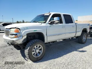 2002 GMC Sierra 1500HD SLE z VIN 1GTGK13U22F213058, wystawiony jako Copart lot #67418174 z przebiegiem 178 940 mil mil oraz Szkody całkowita. Historia ofert i sprzedaży dostępna na DreamBid. Obrazek 1.