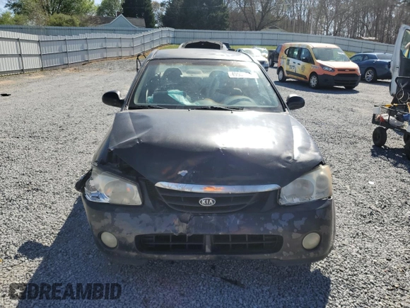 2004 Kia Spectra LX with VIN KNAFE121X45021922, listed as a Copart auction lot 49989845 with 184,189 mi miles and Salvage Title. Bid and sale history available at carsss.com. Image 5.