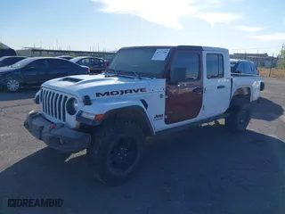 2022 Jeep Gladiator Mojave with VIN 1C6JJTEG6NL100383, listed as a IAAI auction lot 40712989 with 35,283 mi miles. Bid and sale history available at carsss.com. Image 2.