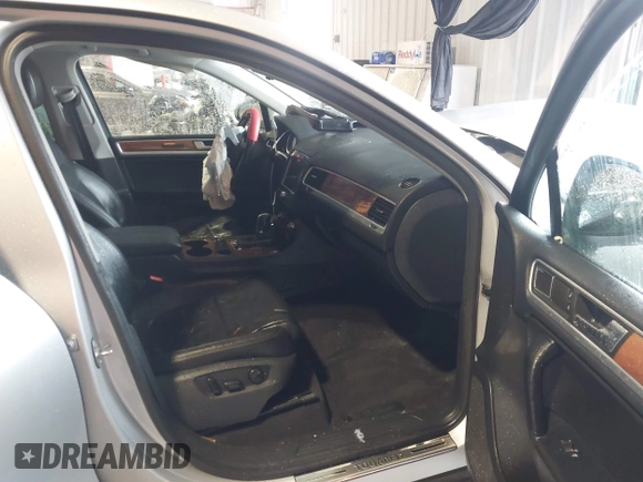2011 Volkswagen Touareg Exec with VIN WVGFK9BP4BD005986, listed as a IAAI auction lot 41183877 with 109,005 mi miles and . Bid and sale history available at DreamBid. Image 5.