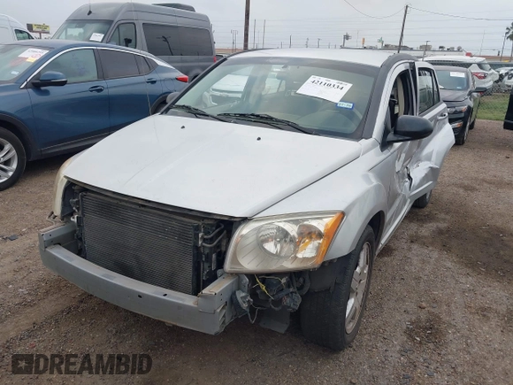 2009 Dodge Caliber SXT with VIN 1B3HB48A59D143888, listed as a IAAI auction lot 42110334 with 182,674 mi miles and . Bid and sale history available at DreamBid. Image 18.