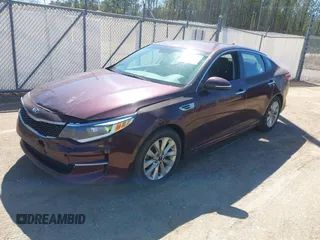 2017 Kia Optima LX with VIN 5XXGT4L33HG163285, listed as a IAAI auction lot 41802193 with 122,159 mi miles. Bid and sale history available at carsss.com. Image 17.