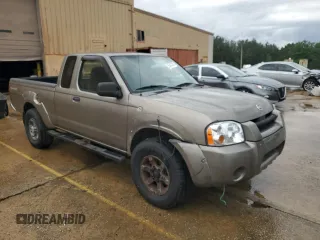 2004 Nissan Frontier XE Desert Runner z VIN 1N6ED26T84C448365, wystawiony jako Copart lot #56487435 z przebiegiem 266 738 mil mil oraz Tytuł czysty. Historia ofert i sprzedaży dostępna na DreamBid. Obrazek 4.