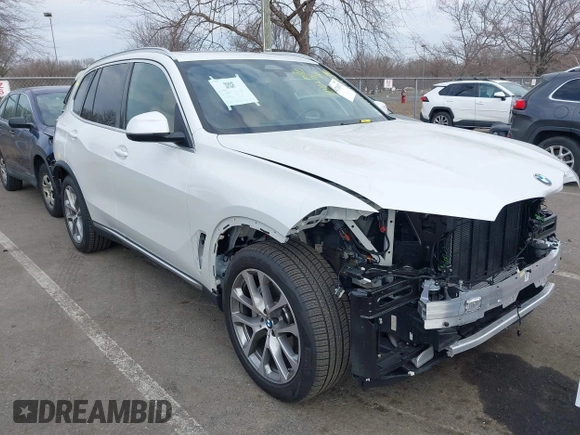 2025 BMW X5 xDrive40i with VIN 5UX23EU06S9W52867, listed as a IAAI auction lot 41726171 with 5,123 mi miles. Bid and sale history available at carsss.com. Image 1.