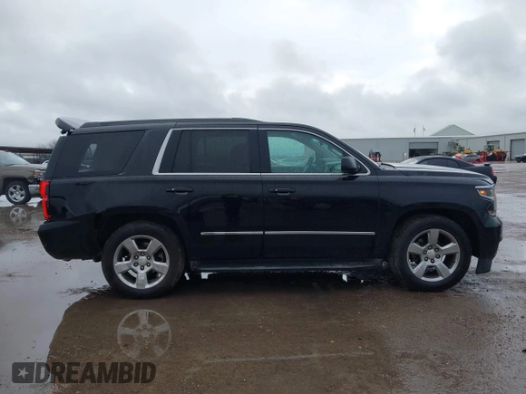 2015 Chevrolet Tahoe LT with VIN 1GNSCBKC2FR632139, listed as a IAAI auction lot 41553087 with 142,775 mi miles and . Bid and sale history available at DreamBid. Image 13.