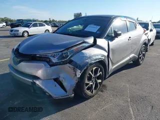 2019 Toyota C-HR XLE with VIN NMTKHMBX4KR082574, listed as a IAAI auction lot 41694921 with 61,777 mi miles and . Bid and sale history available at DreamBid. Image 6.