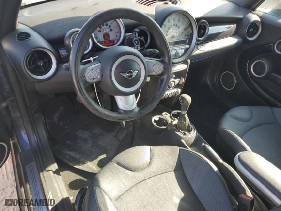 2009 MINI Cooper Convertible with VIN WMWMR33559TU96728, listed as a Copart auction lot 77949004 with 86,084 mi miles and Clean Title. Bid and sale history available at carsss.com. Image 8.