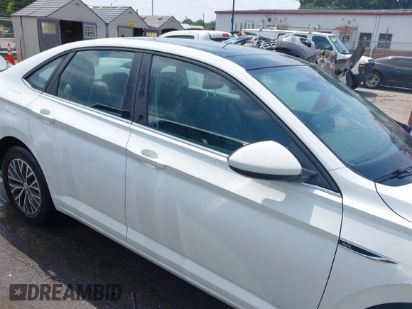 2019 Volkswagen Jetta SEL z VIN 3VWEB7BU8KM171987, wystawiony jako IAAI lot #42597141 z przebiegiem 45 620 mil mil oraz . Historia ofert i sprzedaży dostępna na DreamBid. Obrazek 13.