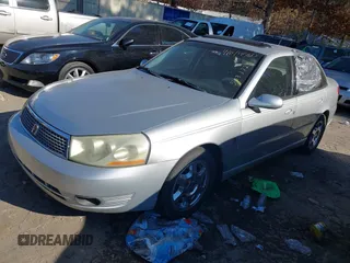 2005 Saturn L with VIN 1G8JD54R95Y503172, listed as a IAAI auction lot 41014580 with 122,932 mi miles. Bid and sale history available at carsss.com. Image 2.