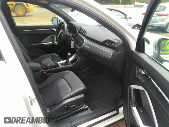 2022 Audi Q3 S line Premium Plus with VIN WA1EECF31N1045258, listed as a IAAI auction lot 42299558 with 19,332 mi miles and . Bid and sale history available at DreamBid. Image 5.