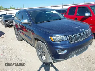 2017 Jeep Grand Cherokee Limited z VIN 1C4RJEBG9HC677036, wystawiony jako IAAI lot #42187687 z przebiegiem 127 802 mil mil oraz . Historia ofert i sprzedaży dostępna na DreamBid. Obrazek 1.