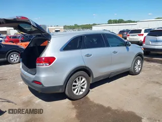 2018 Kia Sorento LX with VIN 5XYPG4A5XJG394663, listed as a IAAI auction lot 40222497 with 125,838 mi miles and . Bid and sale history available at DreamBid. Image 4.
