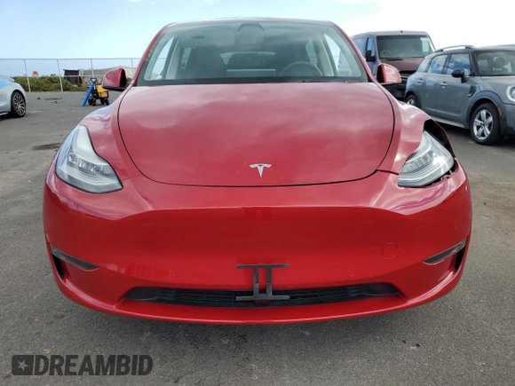 2021 Tesla Model Y Standard Range z VIN 5YJYGDED7MF111377, wystawiony jako Copart lot #45772075 z przebiegiem 34 331 mil mil oraz Szkoda całkowita • Salvage title. Historia ofert i sprzedaży dostępna na DreamBid. Obrazek 5.