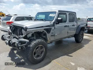 2020 Jeep Gladiator Sport S z VIN 1C6JJTAG9LL149872, wystawiony jako Copart lot #58518095 z przebiegiem 118 910 mil mil oraz Szkoda całkowita • Salvage title. Historia ofert i sprzedaży dostępna na DreamBid. Obrazek 1.