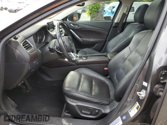 2017 Mazda 6 Grand Touring с VIN JM1GL1W55H1140064, выставлен на аукционе Copart как лот 57503425 с пробегом 74 304 миль миль и Списание • Salvage title. История ставок и продаж доступна на DreamBid. Изображение 7.