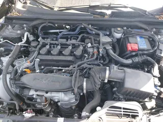 2024 Honda Civic Touring z VIN 2HGFE1F9XRH326146, wystawiony jako IAAI lot #41835336 z przebiegiem 8 469 mil mil oraz . Historia ofert i sprzedaży dostępna na DreamBid. Obrazek 10.