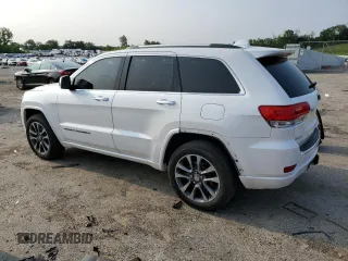 2017 Jeep Grand Cherokee Overland with VIN 1C4RJFCG6HC750819, listed as a Copart auction lot 59764325 with 108,295 mi miles and Clean title. Bid and sale history available at DreamBid. Image 2.