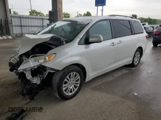 2016 Toyota Sienna XLE with VIN 5TDYK3DC8GS729616, listed as a Copart auction lot 59748995 with 144,469 mi miles and Salvage title. Bid and sale history available at DreamBid. Image 1.
