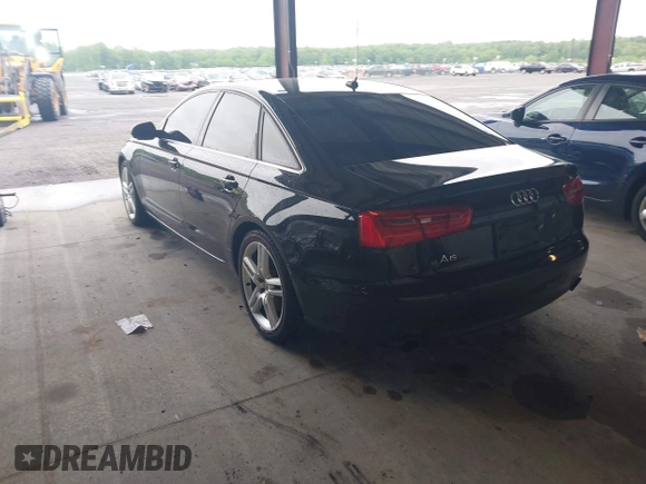 2014 Audi A6 Premium Plus with VIN WAUGFAFC1EN164580, listed as a IAAI auction lot 42220550 with 112,528 mi miles and . Bid and sale history available at DreamBid. Image 3.