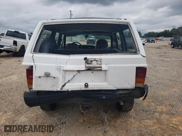 1994 Jeep Cherokee Sport with VIN 1J4FT68S8RL170171, listed as a Copart auction lot 70642694 with 240,165 mi miles and Salvage Title. Bid and sale history available at carsss.com. Image 6.