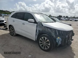 2014 Kia Sorento SX with VIN 5XYKW4A7XEG465798, listed as a Copart auction lot 69377074 with 63,379 mi miles and Salvage Title. Bid and sale history available at carsss.com. Image 4.