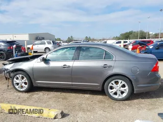 2012 Ford Fusion SE z VIN 3FAHP0HG0CR436745, wystawiony jako IAAI lot #41598812 z przebiegiem 116 305 mil mil oraz . Historia ofert i sprzedaży dostępna na DreamBid. Obrazek 15.