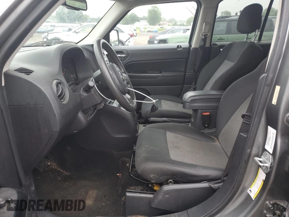 2012 Jeep Patriot Sport z VIN 1C4NJRBBXCD563771, wystawiony jako Copart lot #60524765 z przebiegiem 139 460 mil mil oraz Szkoda całkowita • Salvage title. Historia ofert i sprzedaży dostępna na DreamBid. Obrazek 7.