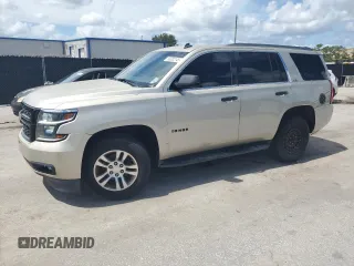 2015 Chevrolet Tahoe LS with VIN 1GNSCAKC2FR141953, listed as a Copart auction lot 65382145 with 271,798 mi miles and Clean title. Bid and sale history available at DreamBid. Image 1.