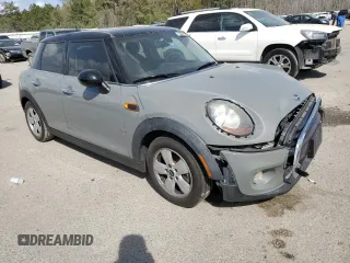 2016 MINI Hardtop 4 Door with VIN WMWXU1C55G2D09641, listed as a Copart auction lot 50567495 with 123,796 mi miles and Salvage Title. Bid and sale history available at DreamBid. Image 4.