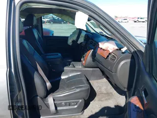 2007 Chevrolet Tahoe LTZ with VIN 1GNFC13J97R155705, listed as a IAAI auction lot 40914171 with 165,727 mi miles and . Bid and sale history available at DreamBid. Image 5.