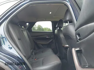 2022 Mazda CX-30 S Premium with VIN 3MVDMBDL0NM413545, listed as a IAAI auction lot 42493594 with 57,013 mi miles and . Bid and sale history available at DreamBid. Image 8.