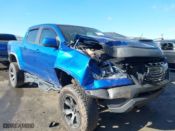 2019 Chevrolet Colorado 4WD ZR2 with VIN 1GCGTEEN5K1279370, listed as a IAAI auction lot 41879724 with 99,012 mi miles. Bid and sale history available at carsss.com. Image 1.