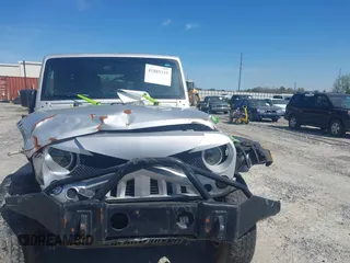 2008 Jeep Wrangler Unlimited Rubicon with VIN 1J4GA691X8L555097, listed as a IAAI auction lot 41889319 with 166,882 mi miles and . Bid and sale history available at DreamBid. Image 12.
