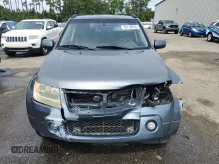 2006 Suzuki Grand Vitara Luxury z VIN JS3TE947164101951, wystawiony jako Copart lot #70110914 z przebiegiem 304 718 mil mil oraz Szkoda całkowita • Salvage title. Historia ofert i sprzedaży dostępna na DreamBid. Obrazek 5.