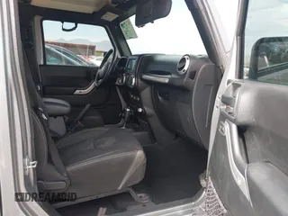 2018 Jeep Wrangler Unlimited Sahara with VIN 1C4BJWEG6JL817231, listed as a IAAI auction lot 42225248 with 68,015 mi miles and . Bid and sale history available at DreamBid. Image 5.