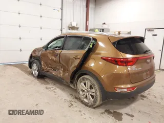 2018 Kia Sportage LX with VIN KNDPM3AC2J7381114, listed as a IAAI auction lot 41214824 with 82,178 mi miles and . Bid and sale history available at carsss.com. Image 3.