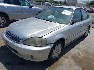 2000 Honda Civic VP with VIN 2HGEJ6610YH505518, listed as a IAAI auction lot 42181742 with 174,836 mi miles. Bid and sale history available at carsss.com. Image 2.