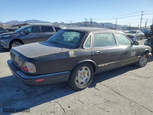 2002 Jaguar XJ VDP with VIN SAJDA24C52LF42702, listed as a Copart auction lot 41927545 with 0 mi miles and Salvage Title. Bid and sale history available at carsss.com. Image 3.