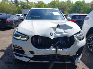2019 BMW X5 xDrive40i with VIN 5UXCR6C56KLL09971, listed as a IAAI auction lot 42193031 with 94,463 mi miles and . Bid and sale history available at DreamBid. Image 12.